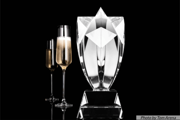 wine enthusiast magazine wine star award with glass of champagin